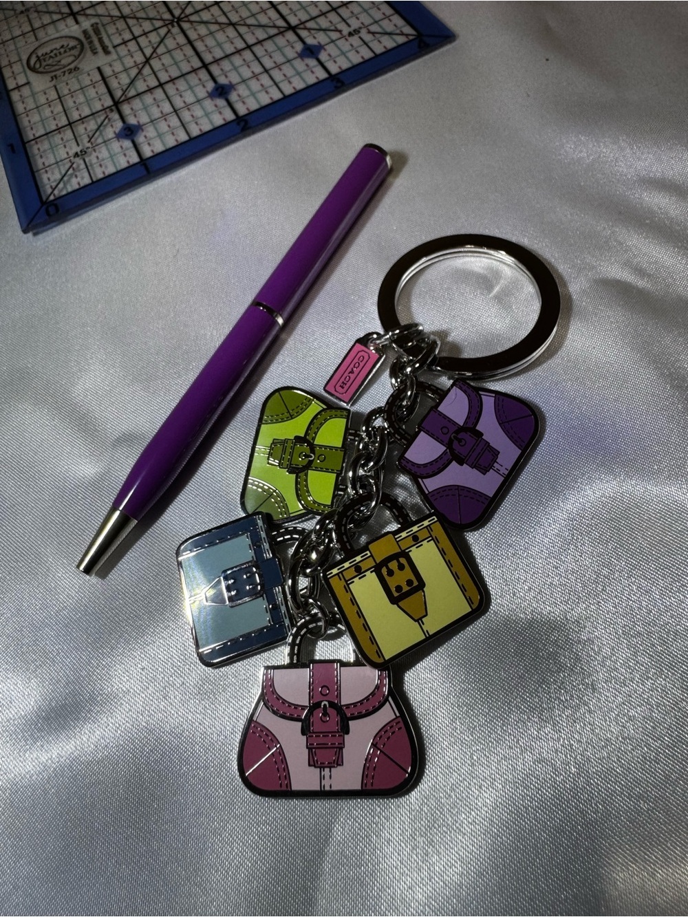 Coach Multicolor Enamel Purse Charm Keyring — Purple, Pink, Yellow, Green, Blue - Picture 3 of 4